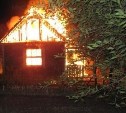 В Охе на одном участке горели две постройки