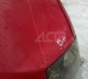 "Весь каркас повело": упавшая с крыши дома в Южно-Сахалинске снежная глыба помяла авто