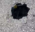 Трубу прорвало, дорогу подмыло: стало известно, почему в Южно-Сахалинске перекрыли движение по Амурской 