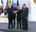 Владимир Путин подписал договоры о принятии в состав России четырех регионов