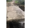 Из-за дождей в Долинске размыло мост в частном секторе