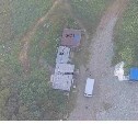Беспилотники обнаружили в лесу на Сахалине подозрительный объект с домом охраны, вагончиками и баней