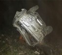 КамАЗ рухнул с 25-метровой высоты ночью на карьере Известковом в Южно-Сахалинске