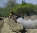 Артель "Восток-2" сбрасывает отходы золотодобычи в реку Лангери без очистки и разрешительных документов (ФОТО)