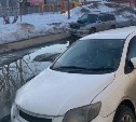 На дорогу "как после танков" жалуются жители улицы Долинской в Южно-Сахалинске