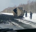 Дорогу в Смирныховском районе засыпало углем
