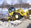 Трактор упал в кювет в Южно-Сахалинске