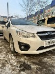 Неизвестный врезался в Subaru Impreza  и скрылся с места ДТП в Южно-Сахалинске, Фото: 5
