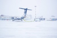Аэропорт Южно-Сахалинска занесло снегом, Фото: 8