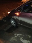 Автомобиль ушел колесом под землю на перекрестке в Аниве, Фото: 12