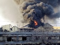 Дым от горящих на территории БУМа автопокрышек заволок Холмск, Фото: 6