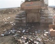 Более 1000  дисков раздавил бульдозер в Южно-Сахалинске, Фото: 8