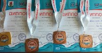 Сахалинские "солнечные" дети привезли семь медалей с всероссийских соревнований по плаванию, Фото: 5