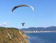 Пес жителя Корсаковского района летает на параплане вместе с хозяином, Фото: 4