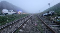 Внедорожник перевернулся у железной дороги на Сахалине, Фото: 1