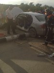 Девушка пострадала при столкновении грузовика и легковушки в Южно-Сахалинске, Фото: 1