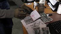 Мошенников, которые портили чужие паспорта за деньги, задержали в Южно-Сахалинске, Фото: 6