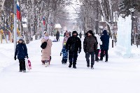 Игра в снежки, хороводы и кёрлинг: Рождество отметили в городском парке Южно-Сахалинска, Фото: 16