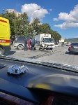Три человека получили травмы при столкновении микроавтобуса и грузовика в Южно-Сахалинске, Фото: 4