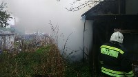 Горящий деревянный дом потушили в центре Южно-Сахалинска, Фото: 1