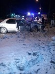 Два человека пострадали при столкновении легкового автомобиля и грузовика в Южно-Сахалинске, Фото: 4