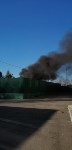 Мусор и автопокрышки горели в заброшенном гараже в Южно-Сахалинске, Фото: 1