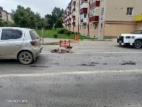 Провал на перекрёстке проспекта Мира и улицы Поповича заделывают в Южно-Сахалинске, Фото: 1