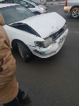 Легковой седан и внедорожник столкнулись в Южно-Сахалинске, Фото: 2