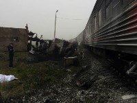 На Сахалине пассажирский поезд столкнулся с большегрузным автомобилем, Фото: 10