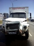 Грузовик врезался в пассажирский автобус столкнулись в Южно-Сахалинске, Фото: 1