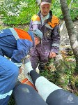 Спасатели на носилках вынесли из леса пострадавшую на Курилах туристку, Фото: 7