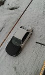 В Холмске с крыши упала снежная масса, Фото: 3