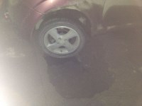 Автомобиль ушел колесом под землю на перекрестке в Аниве, Фото: 8