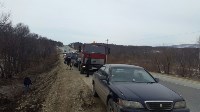 Такси воткнулось в кювет после столкновения с трактором в пригороде Южно-Сахалинска, Фото: 4