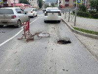Провал на перекрёстке проспекта Мира и улицы Поповича заделывают в Южно-Сахалинске, Фото: 2