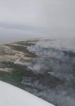 На острове Уш в Охинском районе загорелись трава и кустарники, Фото: 1