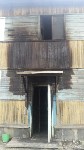 Через окна пришлось эвакуироваться жильцам горящего дома в Южно-Сахалинске, Фото: 1