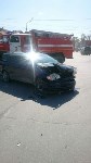 Автомобиль охранного агентства столкнулся с легковушкой в Южно-Сахалинске, Фото: 1