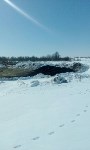 Буровой шлам возят с месторождения Одопту на мусорную свалку рядом с Тунгором, Фото: 2