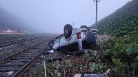 Внедорожник перевернулся у железной дороги на Сахалине, Фото: 2
