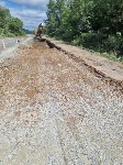 На участках федеральной трассы Южно-Сахалинск – Холмск обновляют дорожное покрытие, Фото: 4