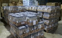 Полицейские в Южно-Сахалинске изъяли у предпринимателя 7 тысяч бутылок водки, Фото: 3
