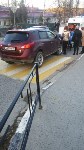 Nissan Murano сбил женщину на пешеходном переходе в Корсакове, Фото: 3