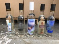 Больше двух тысяч бутылок и канистр контрафактного алкоголя изъяли на Сахалине, Фото: 6