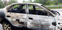 Toyota Corona сгорела на трассе в Долинском районе, Фото: 1